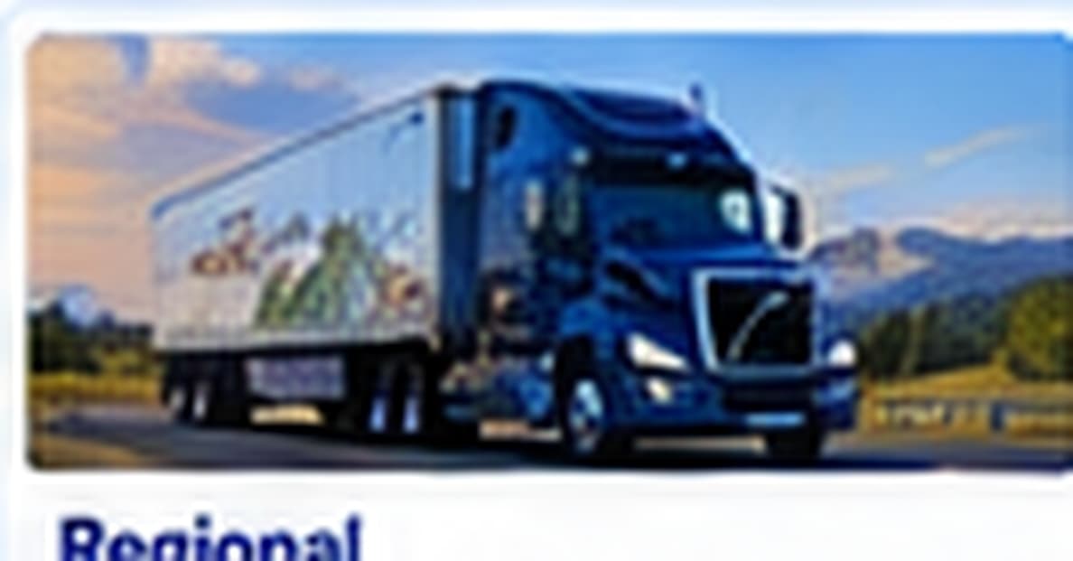 Blue tractor-trailer on a mountain highway