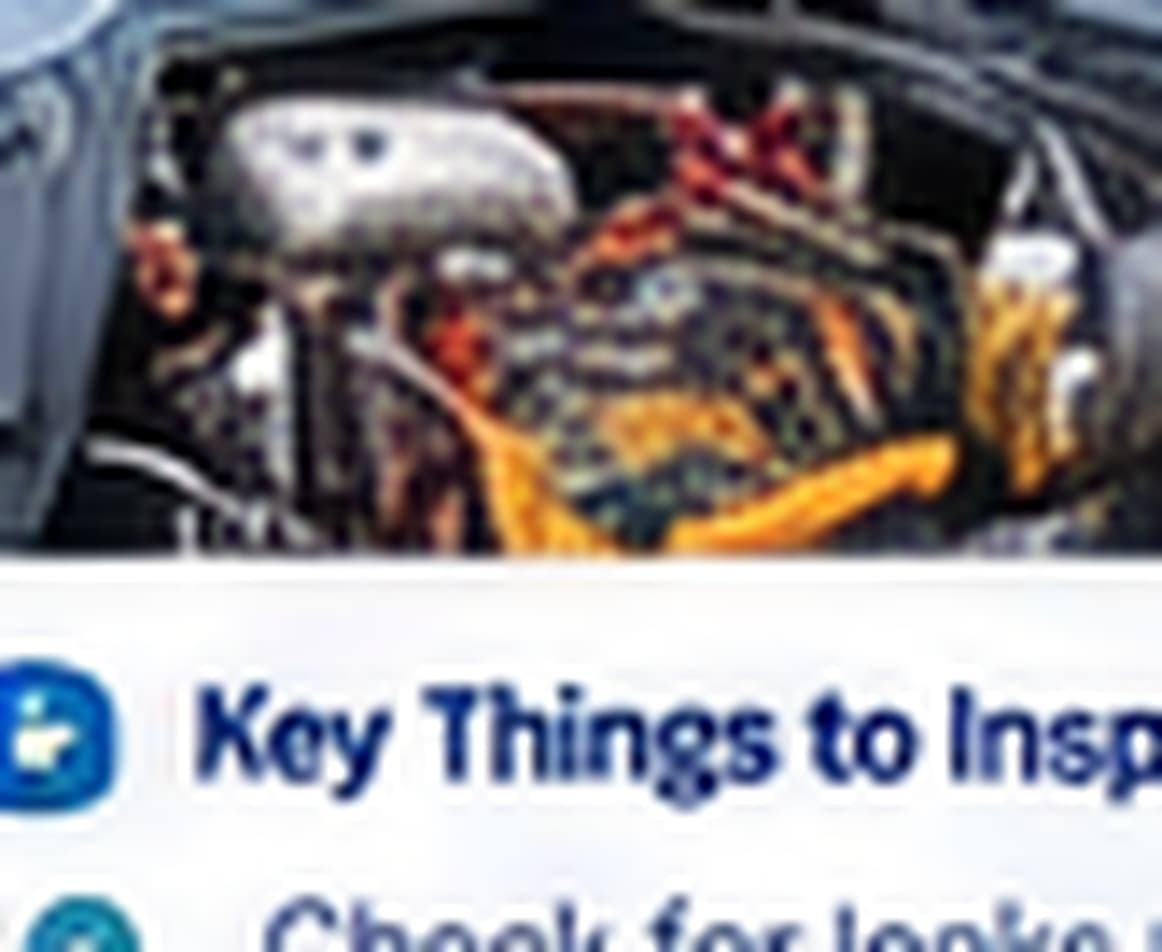 Open engine compartment of a tractor